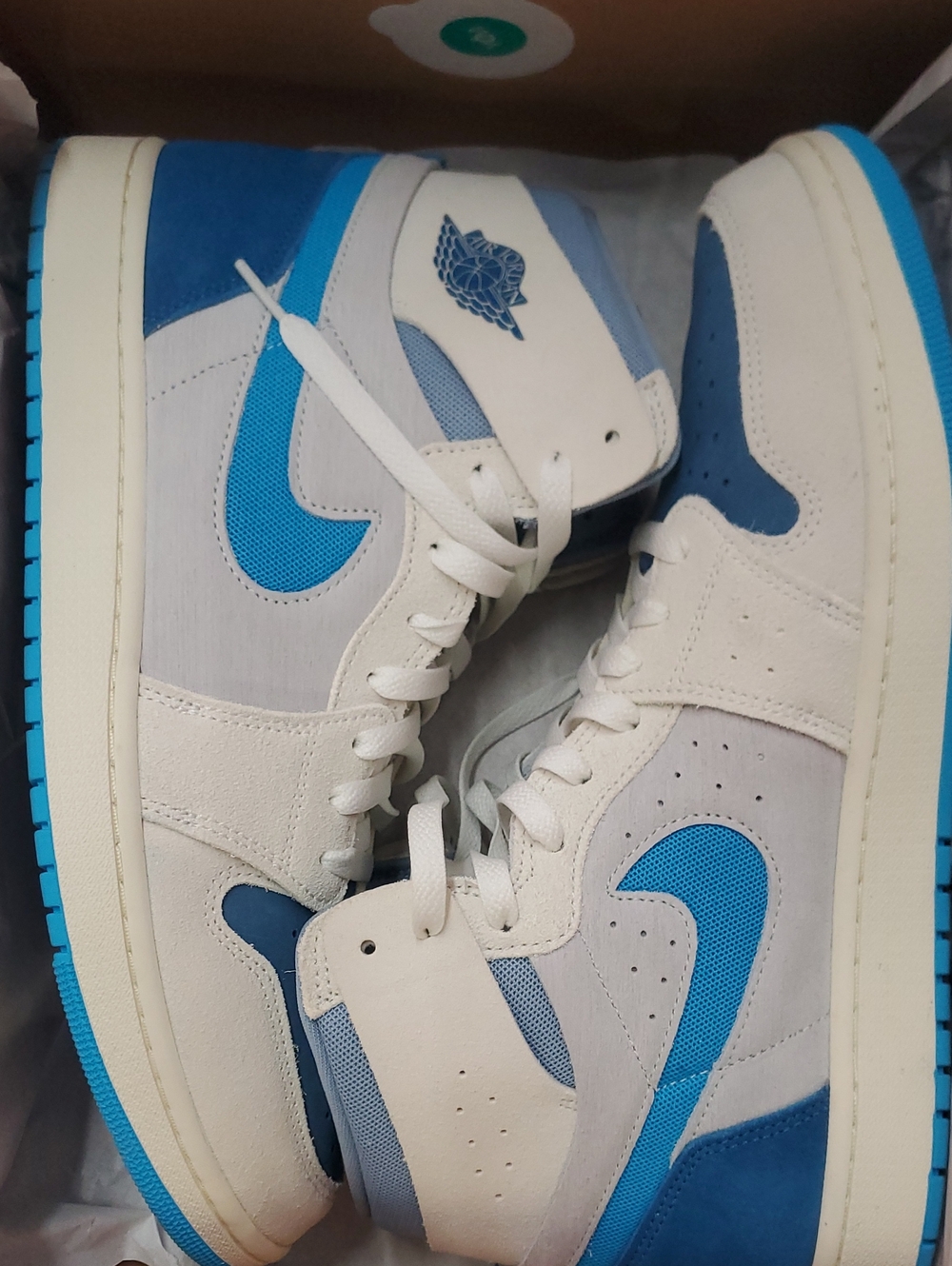 Jordan Men’s Mid-Top Sneakers in White and Blue